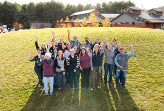 Group of employee-owners outside on King Arthur's campus